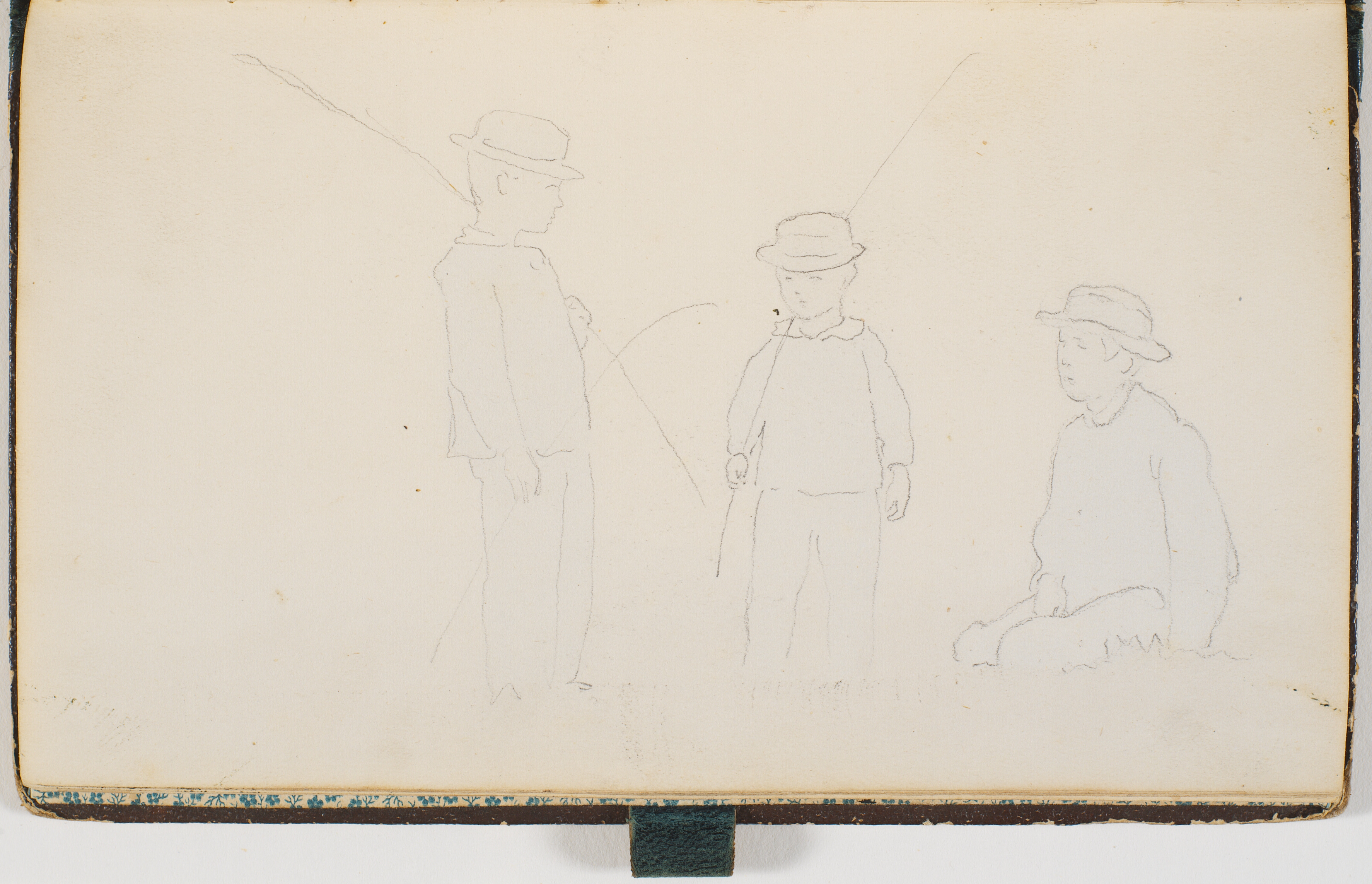 Tre drenge med stråhatte